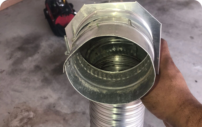 At Clean & Green Air we are professional dryer vent cleaning service: See the difference it makes in this before and after photo